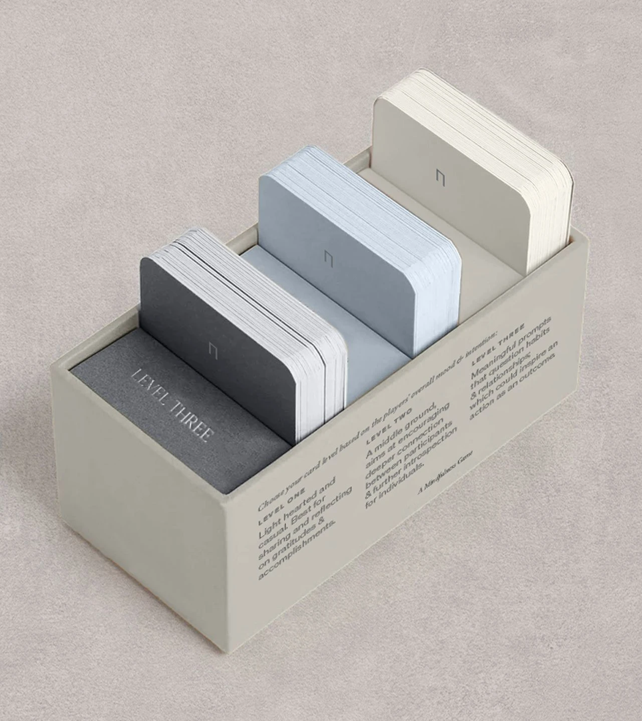 Sensei Nourish card game gifting set with multiple decks of cards arranged in a branded rectangular box