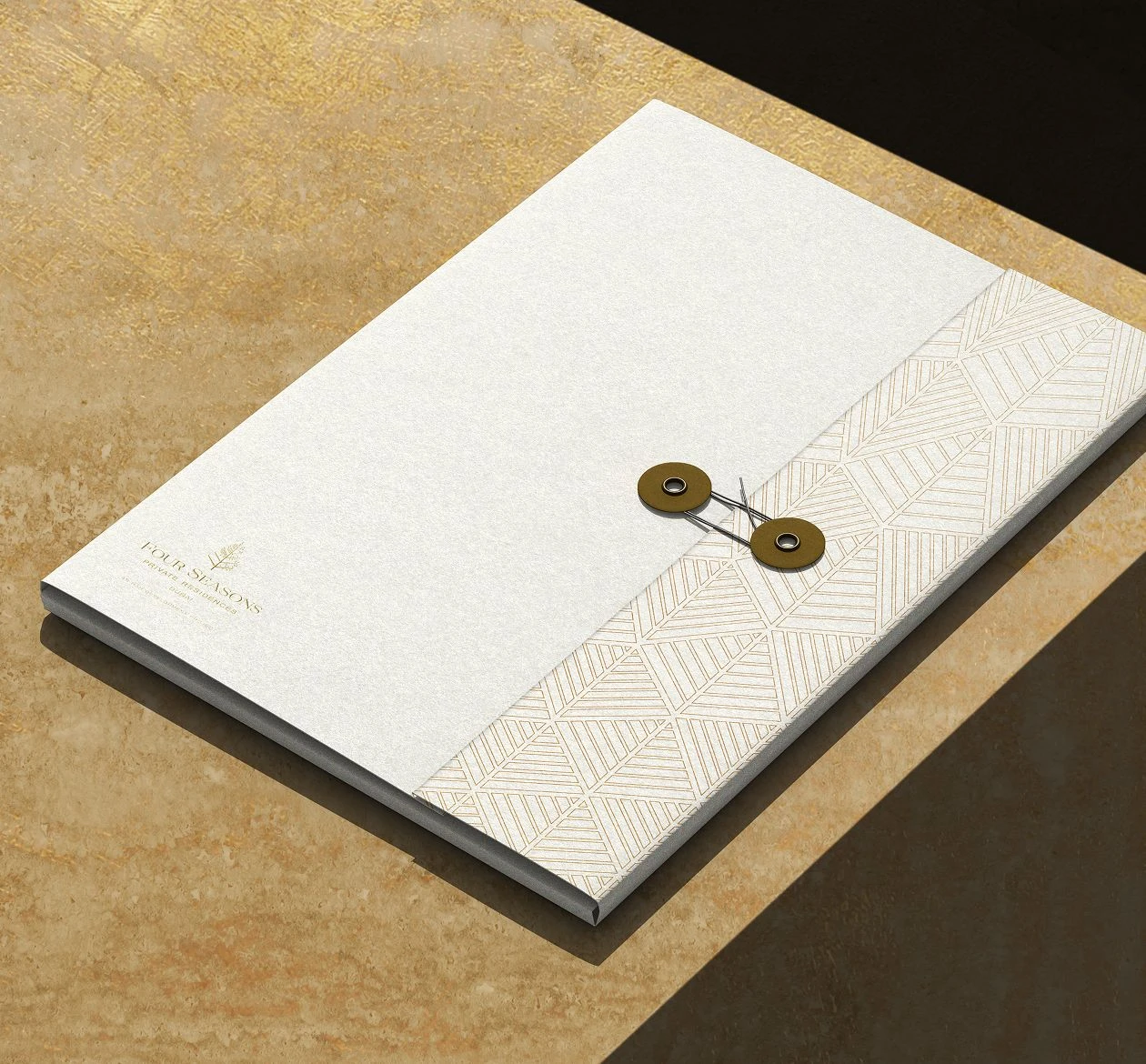 Four Seasons luxury presentation folder with patterned insert, and textured paper stock