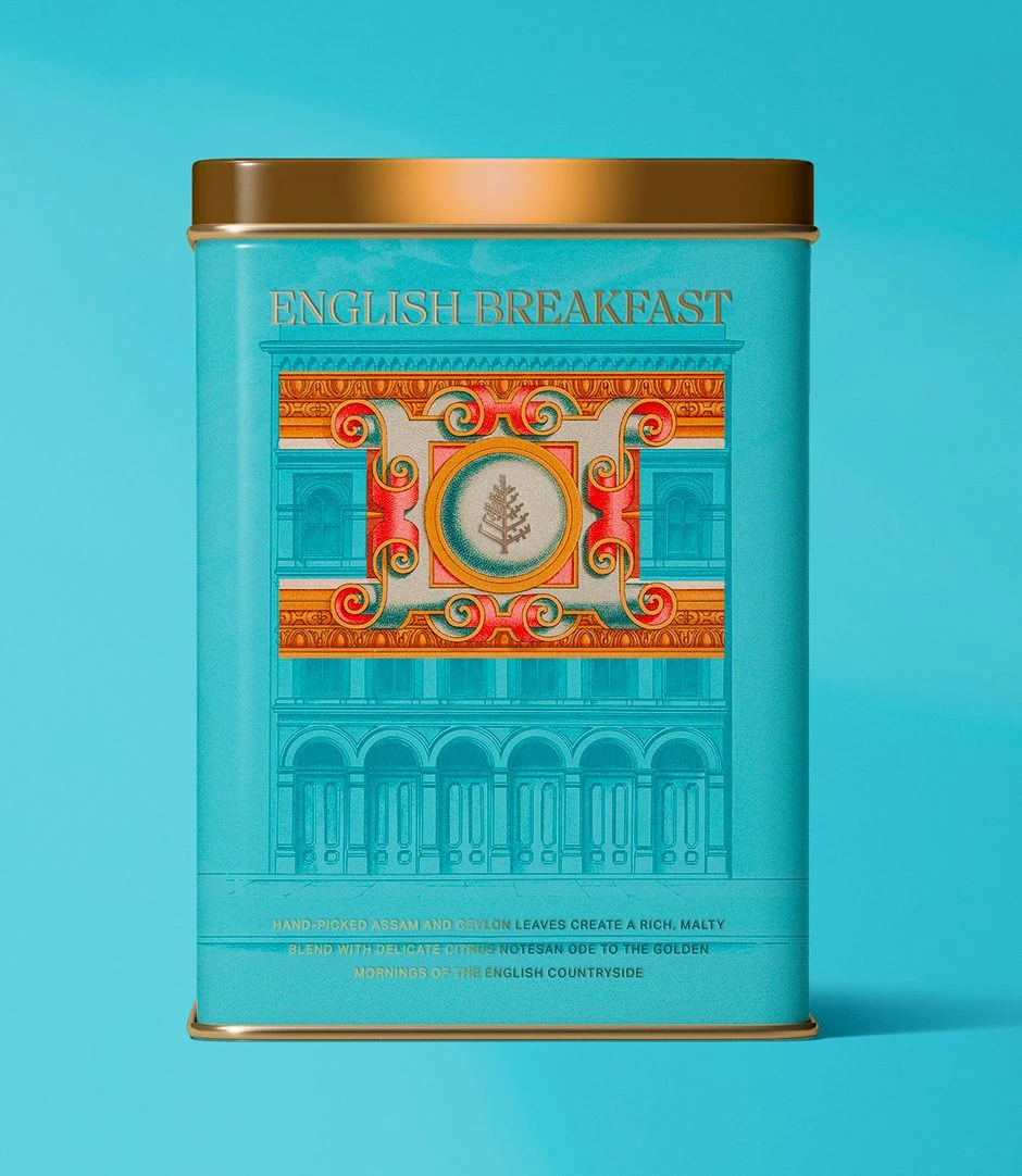 English Breakfast tea packaging design featuring a turquoise tin with ornate illustrated label and gold lid.