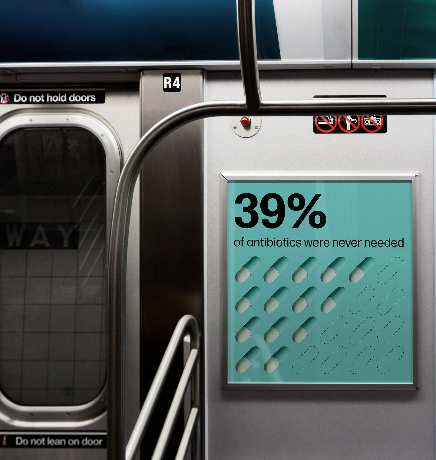 Choosing Wisely Canada health poster installed inside a subway car, featuring antibiotic overuse statistics and graphic pill imagery
