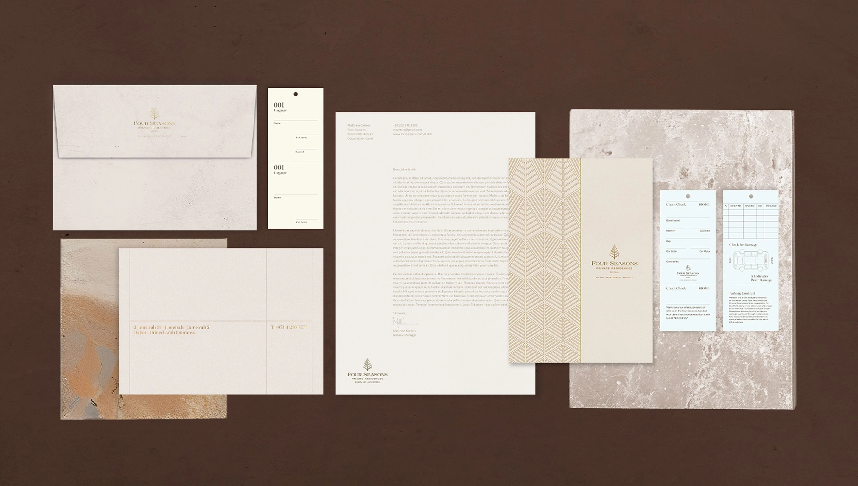 Four Seasons Marrakech Residential collateral design featuring envelopes, letterhead, printed inserts, and branded materials.